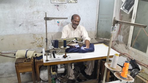 Expert leather and textile stitcher